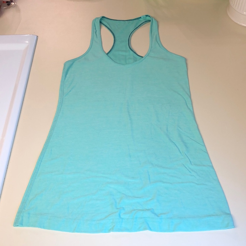 Lululemon workout top, size 6, teal color
